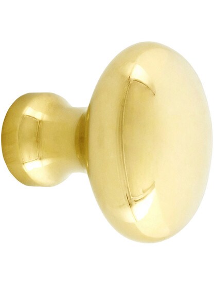 Solid Brass Oval Cabinet Knob - 1 1/4 inch x 7/8 inch in Unlacquered Brass.